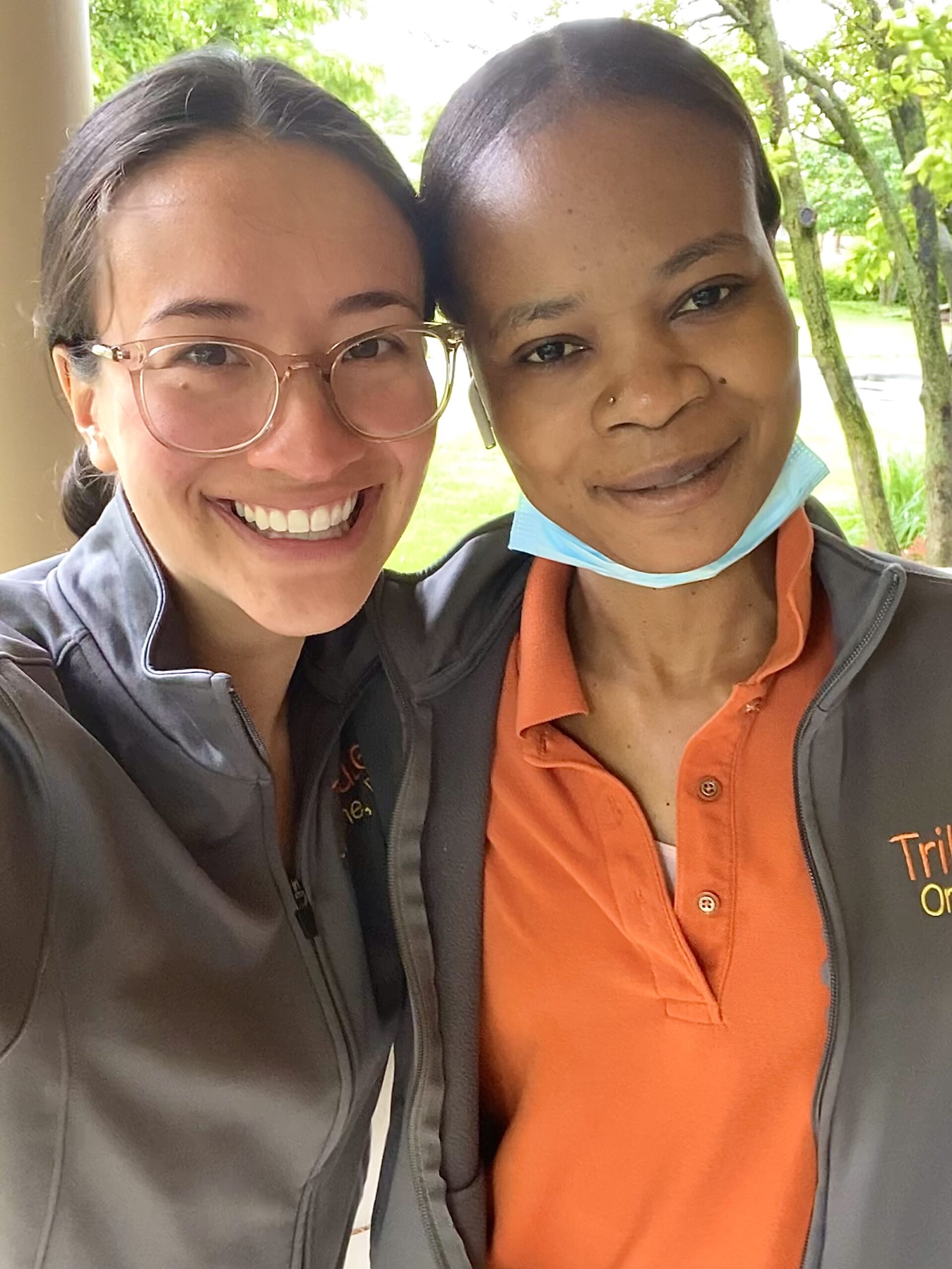 Tribute Caregivers Oneikha and Julianne smiling together