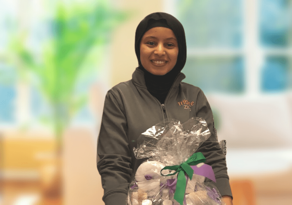 Tribute Caregiver celebrates remarkable work with gift basket from Tribute Home Care