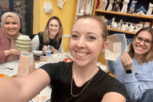 Tribute Chicago team members making pottery: Raheba Batool, Carrie Faerber, Jodie Murphy, and Dova Weinberger