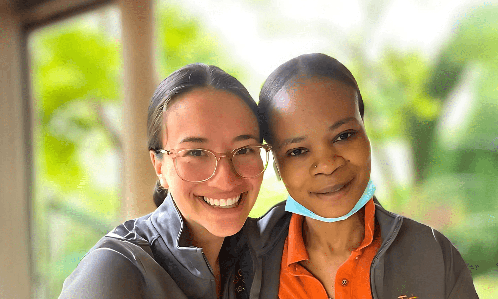 2 Tribute Caregivers smiling in Tribute Home Care uniforms