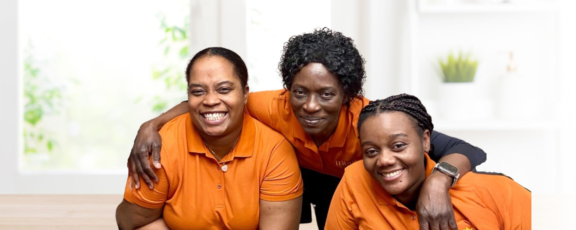 Tribute Caregivers smiling in Tribute Home Care uniforms